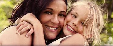 London nanny with happy smiling child on London