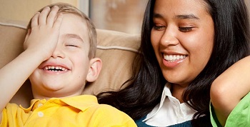 Asian Nanny with Happy Child